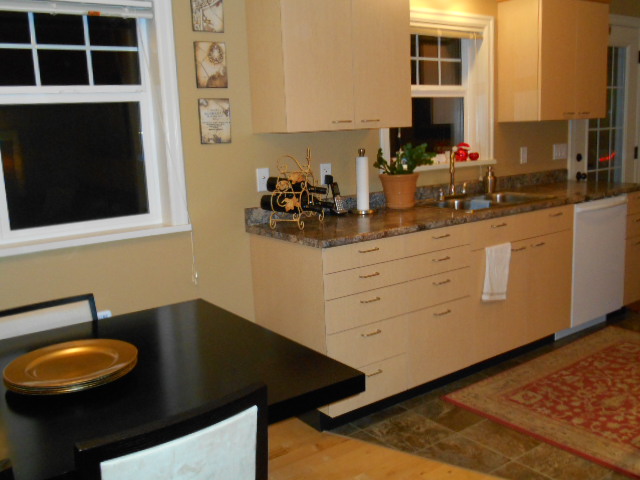 kitchen with quiet Bosch dishwasher, garden view over sink Carriage House rental Mt. Tolmie Victoria
